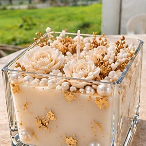 Pearl Éclat decorative premium soy wax candle in a square glass cup